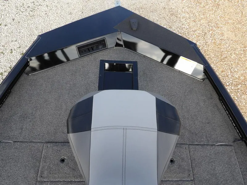 Slide: The Image of 2025 Crestliner XFC 189 boat interior with gray and black seating. - 28