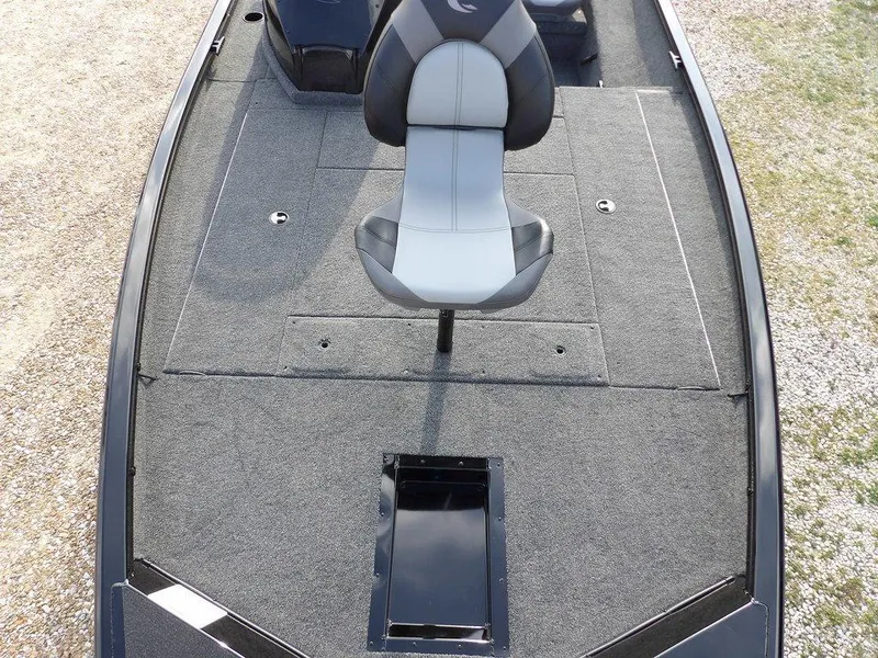 Slide: The Image of 2025 Crestliner XFC 189 boat interior with a central seat and carpeted deck. - 35