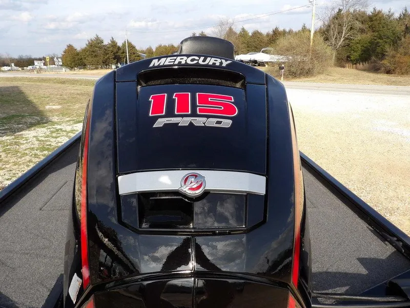 Slide: The Image of Mercury 115 Pro outboard motor on 2025 Crestliner XFC 189 boat, outdoor setting. - 37