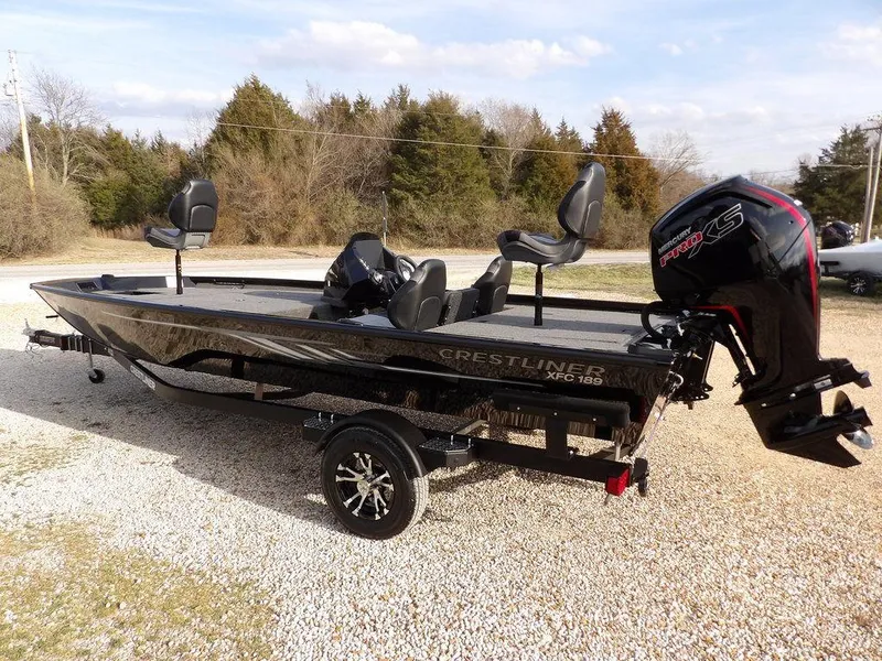 Slide: The Image of 2025 Crestliner XFC 189 fishing boat with Mercury Pro XS engine on gravel. - 4