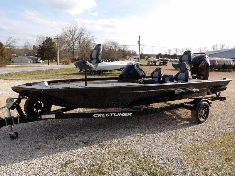 Slide: The Image of 2025 Crestliner XFC 189 fishing boat on trailer, parked outdoors. - 5
