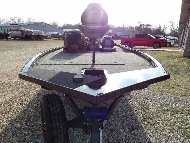 Slide: The Image of 2025 Crestliner XFC 189 boat on trailer in outdoor setting. - 8