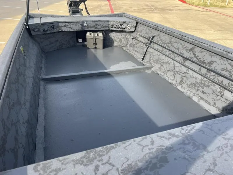 Slide: The Image of 2025 Gator Tail 17/54 EXTREME SERIES boat interior with camouflage design and spacious layout. - 11