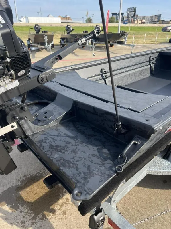 Slide: The Image of 2025 Gator Tail 17/54 EXTREME SERIES boat on trailer, showcasing rear deck and motor. - 14