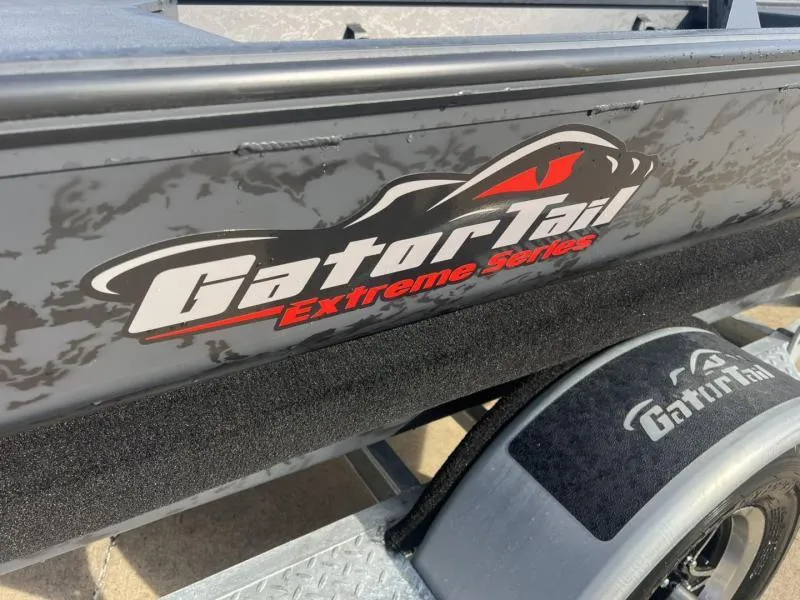 Slide: The Image of 2025 Gator Tail 17/54 Extreme Series boat with logo on trailer. - 17