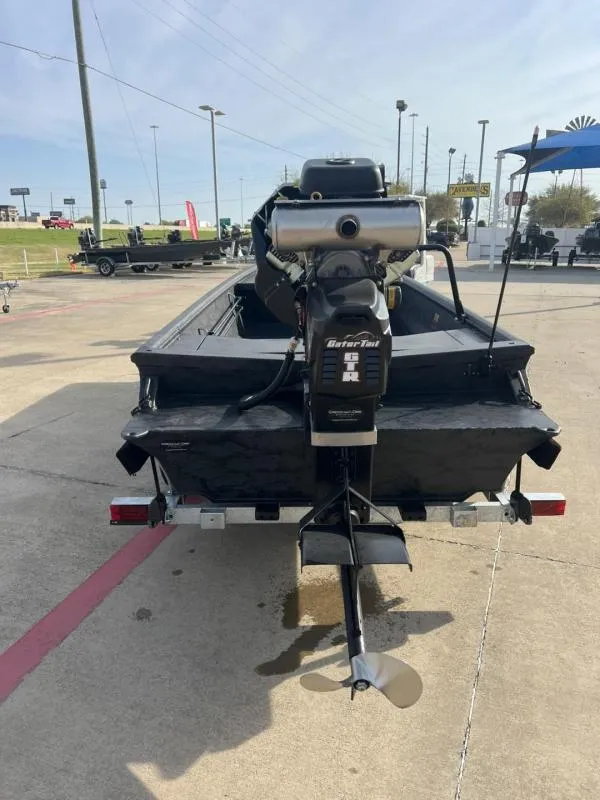 Slide: The Image of 2025 Gator Tail 17/54 EXTREME SERIES boat with powerful outboard motor on trailer. - 4