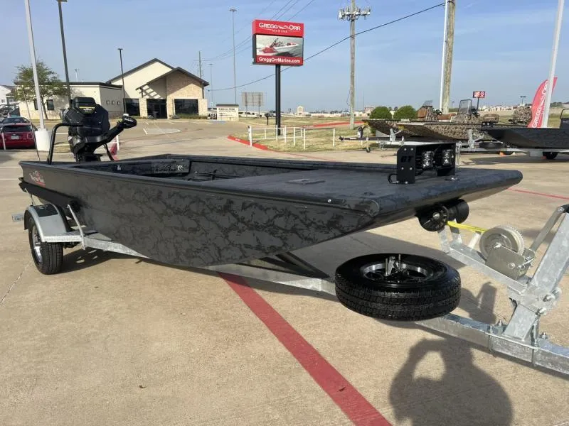 Slide: The Image of 2025 Gator Tail 17/54 EXTREME SERIES boat on trailer in parking lot. - 7