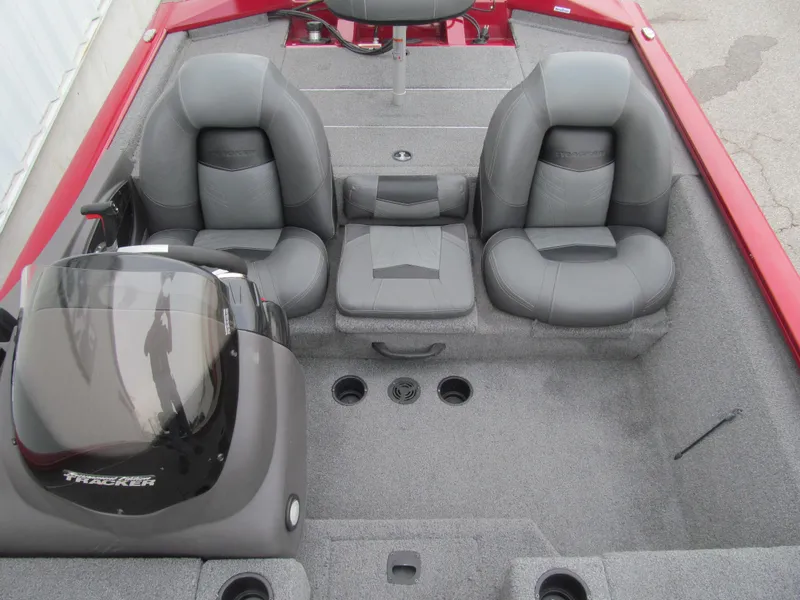 Slide: The Image of 2020 Tracker Pro Team 190 TX Tournament Edition boat interior with gray seating and red accents. - 11