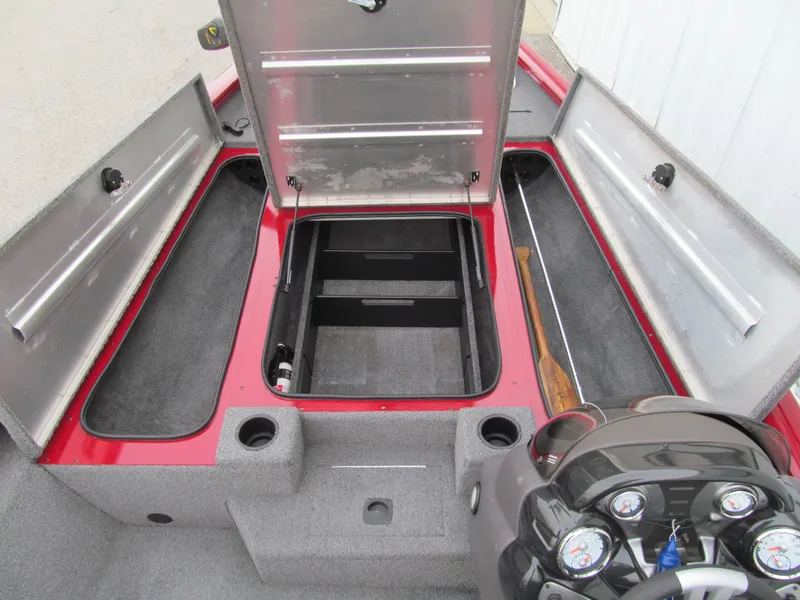 Slide: The Image of 2020 Tracker Pro Team 190 TX Tournament Edition boat with open storage compartments. - 8