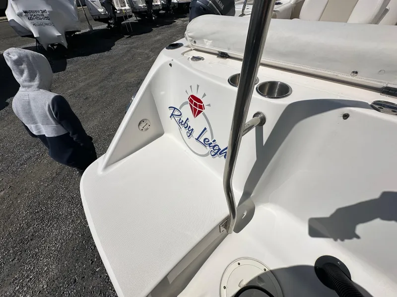 Slide: The Image of 2014 Robalo R227 Dual Console boat with "Ruby Leigh" logo on deck. - 33