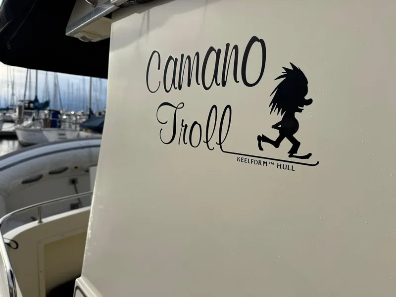 Slide: The Image of 2003 Camano Troll boat with distinctive logo and Keelform hull design. - 2