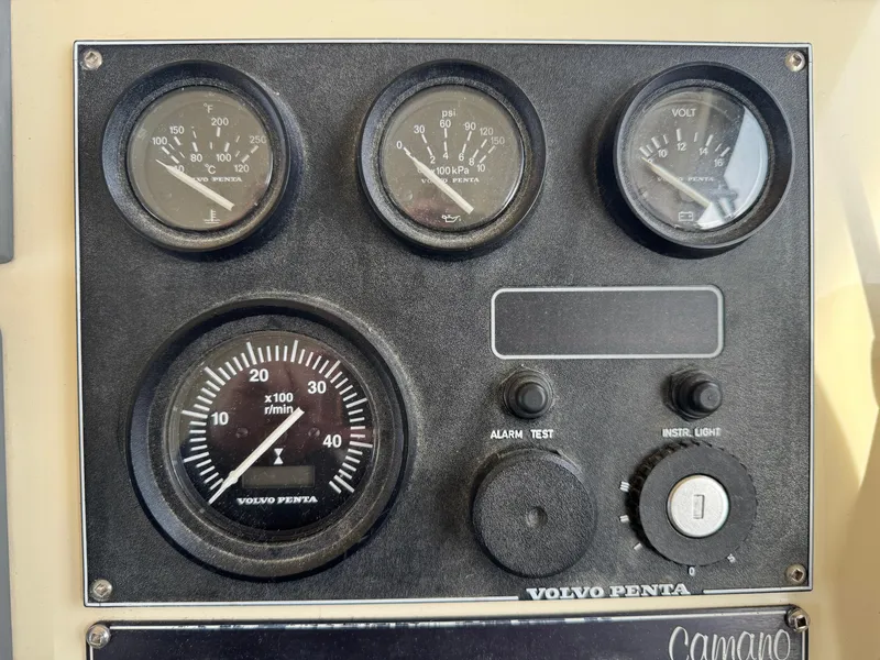 Slide: The Image of Instrument panel of a 2003 Camano Troll boat with Volvo Penta gauges. - 31