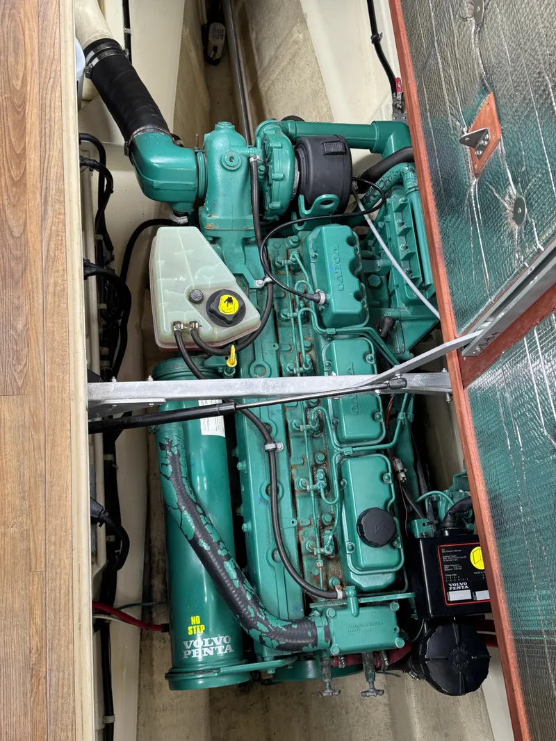 Slide: The Image of 2003 Camano Troll engine compartment with Volvo Penta marine engine. - 37