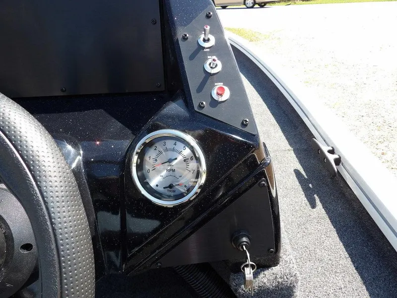 Slide: The Image of Control panel of 2025 Crestliner XFC 189 boat with gauges and switches. - 20