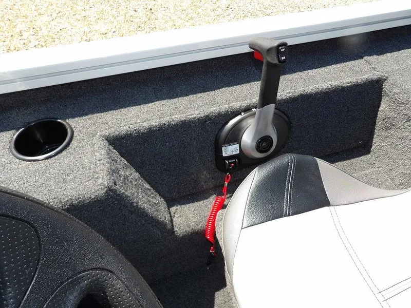 Slide: The Image of Interior of 2025 Crestliner XFC 189 boat with control lever and seating. - 21