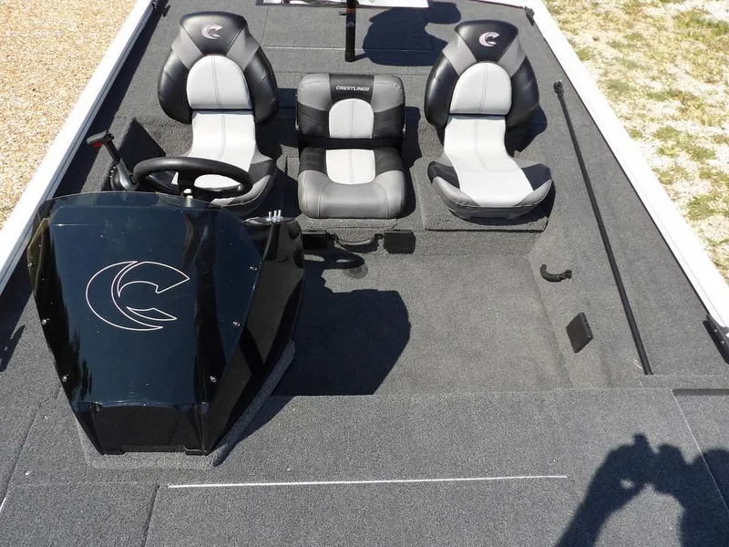 Slide: The Image of 2025 Crestliner XFC 189 boat interior with three seats and steering console. - 22