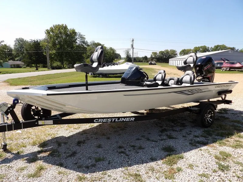 Slide: The Image of 2025 Crestliner XFC 189 fishing boat on trailer, parked outdoors. - 3