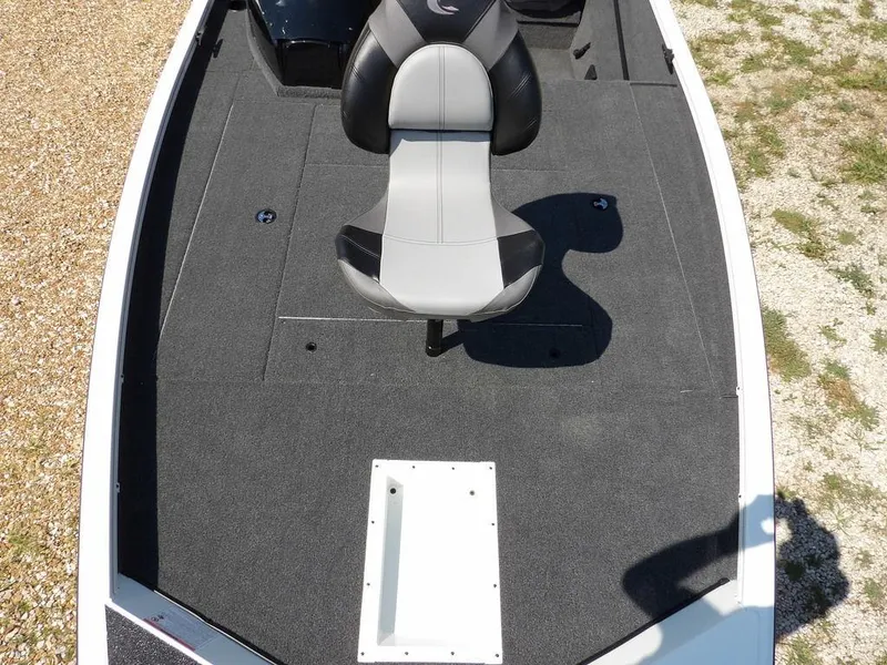 Slide: The Image of 2025 Crestliner XFC 189 boat interior with gray seating and carpeted deck. - 32