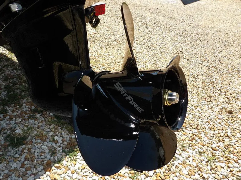 Slide: The Image of Propeller of 2025 Crestliner XFC 189 boat on gravel surface. - 39