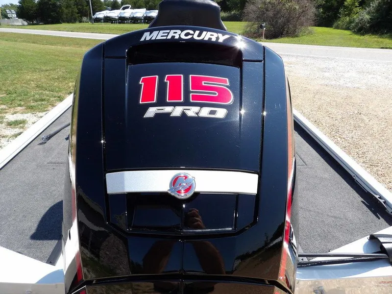 Slide: The Image of Mercury 115 Pro outboard motor on 2025 Crestliner XFC 189 boat, parked outdoors. - 41
