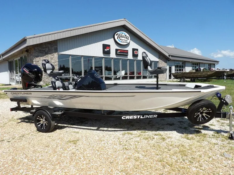 Slide: The Image of 2025 Crestliner XFC 189 boat on trailer, parked outside dealership. - 42