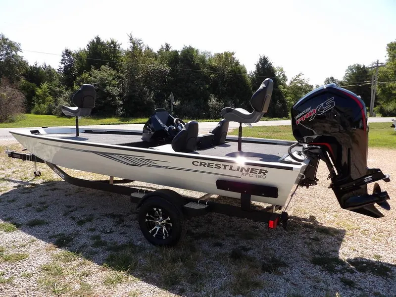 Slide: The Image of 2025 Crestliner XFC 189 fishing boat on trailer, parked outdoors. - 5