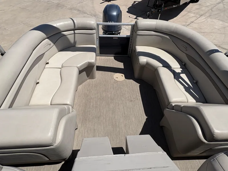 Slide: The Image of 2018 Bennington 22 SSRX pontoon boat with spacious seating and modern design. - 7