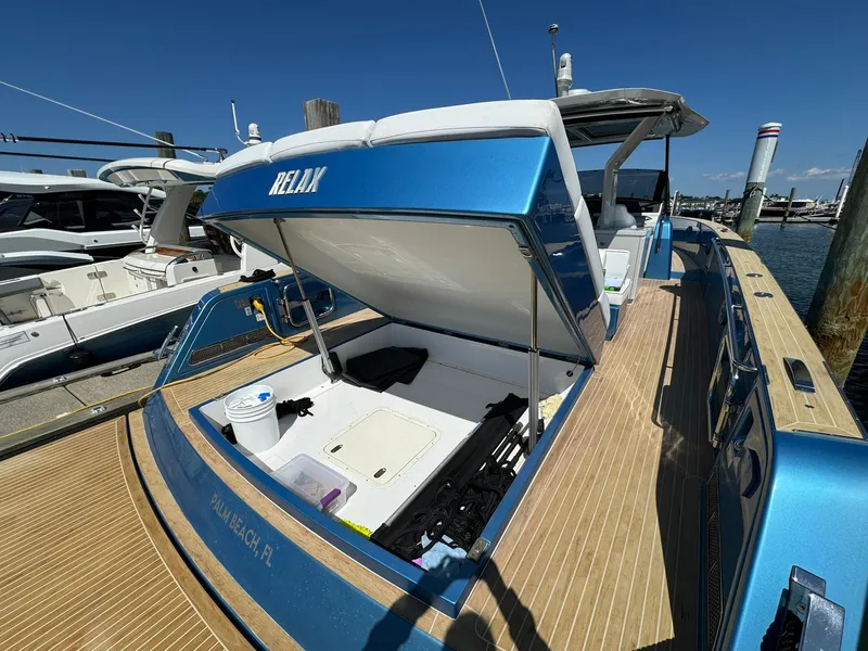 Slide: The Image of 2022 Pardo Yachts 43 docked, featuring sleek design and spacious deck in Palm Beach, FL. - 6