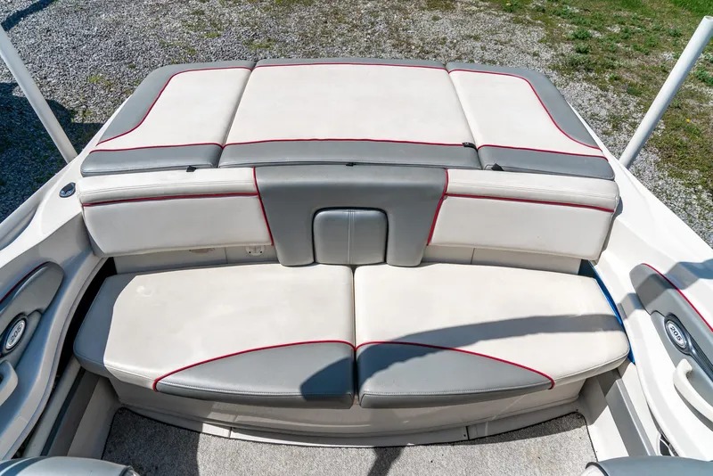 Slide: The Image of 2008 Sea Ray 205 Sport boat seating with gray and red accents. - 29