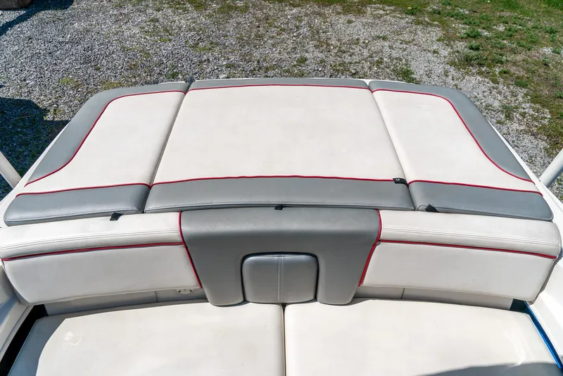 Slide: The Image of 2008 Sea Ray 205 Sport boat seating with gray and red accents. - 30