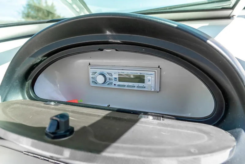 Slide: The Image of Dashboard stereo system in 2008 Sea Ray 205 Sport boat. - 33