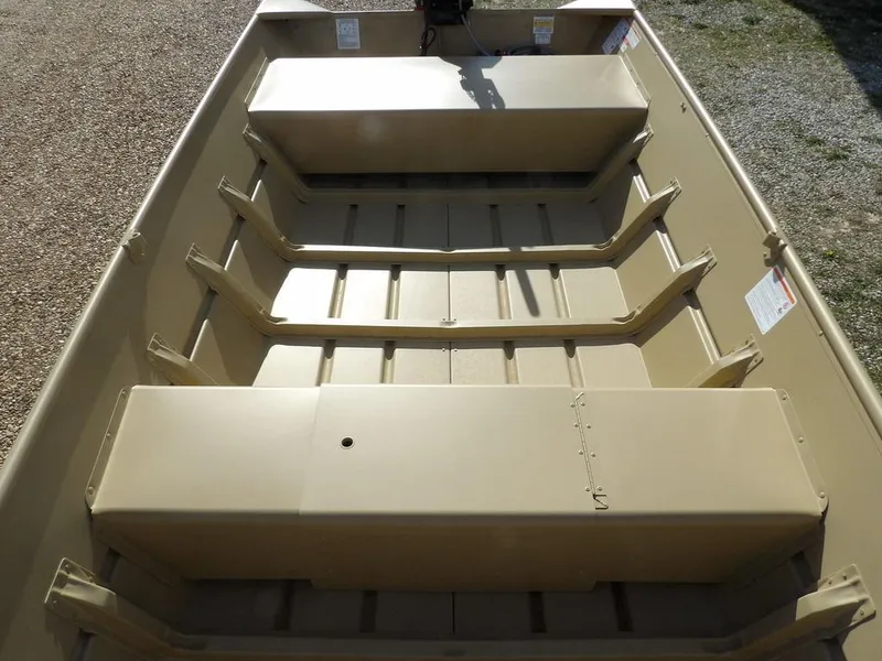 Slide: The Image of 2025 Crestliner 1648M CR Jon boat interior with bench seats and spacious layout. - 14