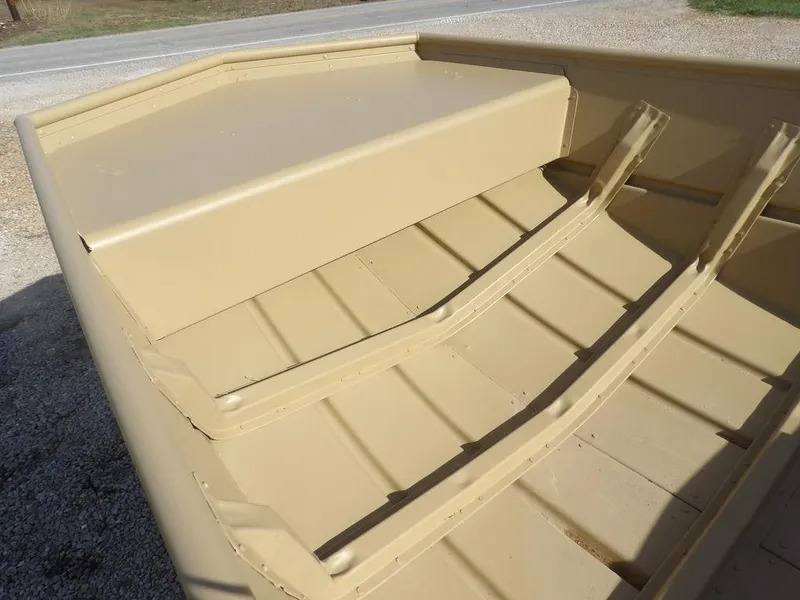 Slide: The Image of 2025 Crestliner 1648M CR Jon boat interior, showcasing durable seating and storage. - 15