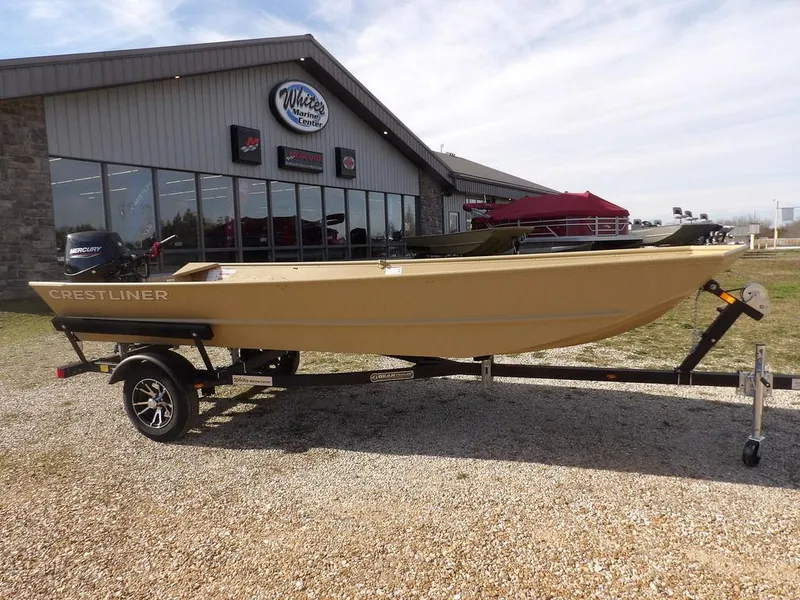 Slide: The Image of 2025 Crestliner 1648M CR Jon boat on trailer outside dealership. - 2