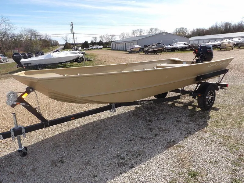 Slide: The Image of 2025 Crestliner 1648M CR Jon boat on trailer, parked outdoors on gravel. - 4