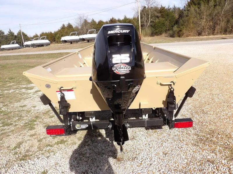 Slide: The Image of 2025 Crestliner 1648M CR Jon boat with Mercury 25 horsepower outboard motor, parked on gravel. - 7