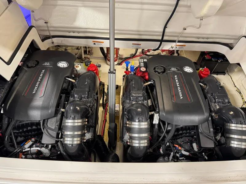 Slide: The Image of 2023 Regal 3300 boat engine compartment with dual Volvo Penta V8 engines. - 21