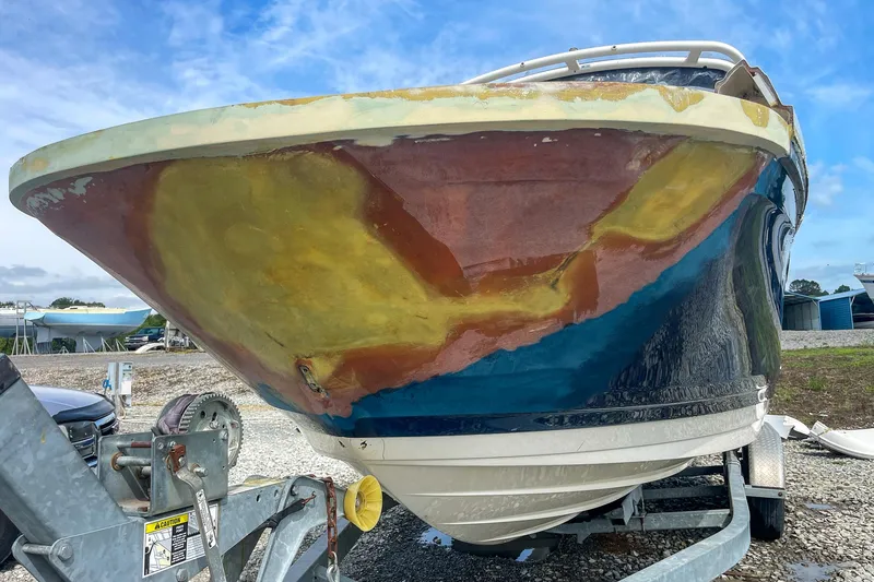 Slide: The Image of 2019 Sea Ray 270 Sundeck SDX on trailer, showing hull repair work. - 23