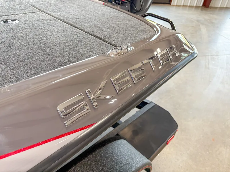 Slide: The Image of 2025 Skeeter ZXR 19 boat detail, showcasing sleek design and branding. - 2