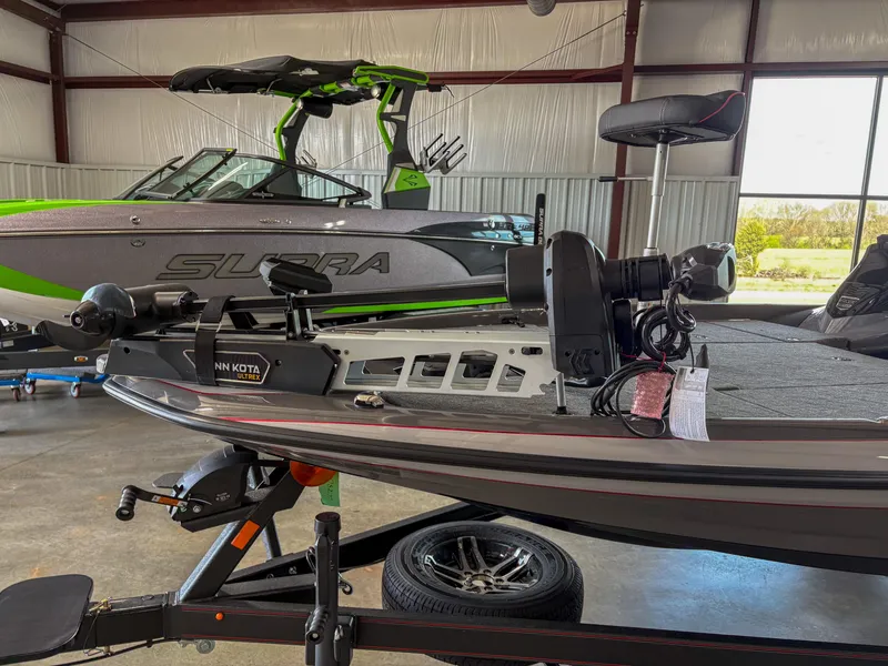 Slide: The Image of 2025 Skeeter ZXR 19 boat in showroom, featuring advanced trolling motor and sleek design. - 7