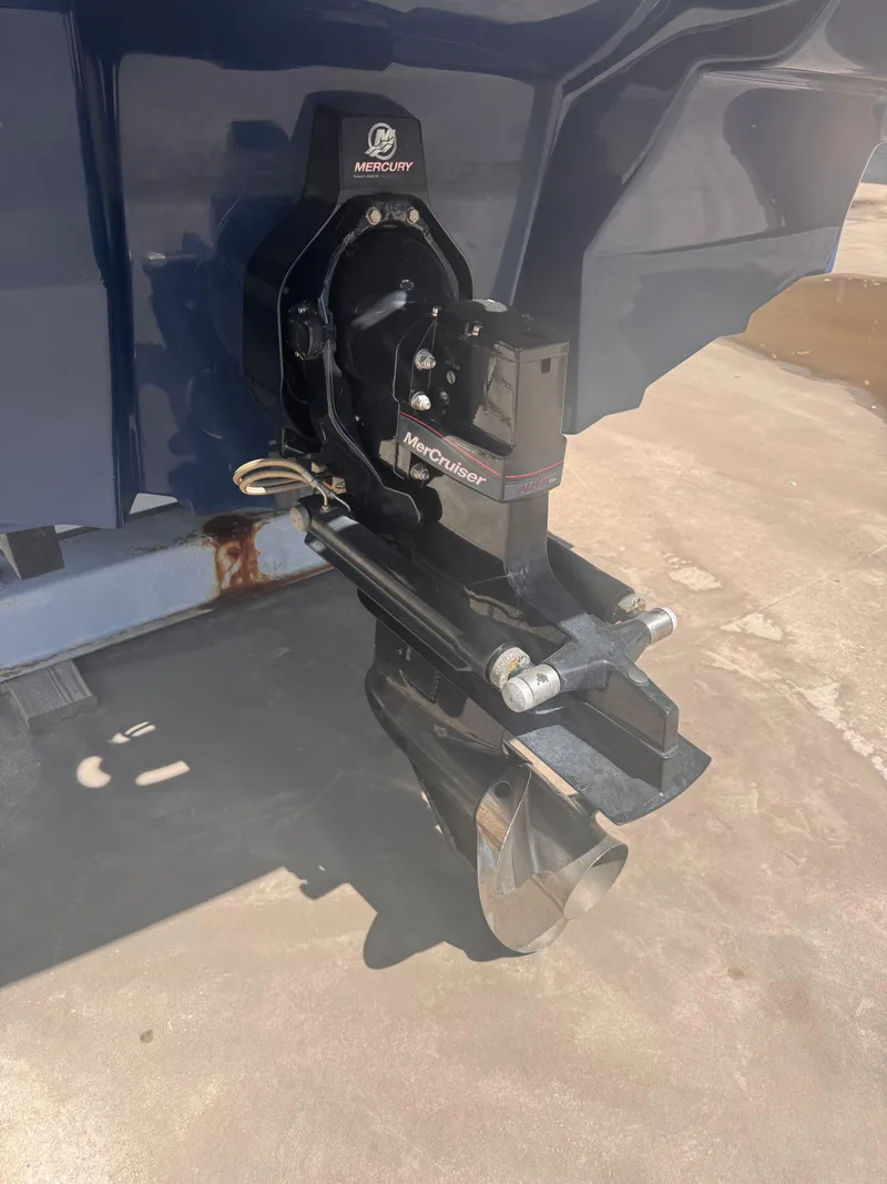 Slide: The Image of 2012 Sea Ray 200 SD boat with Mercury MerCruiser outdrive, parked on a trailer. - 12