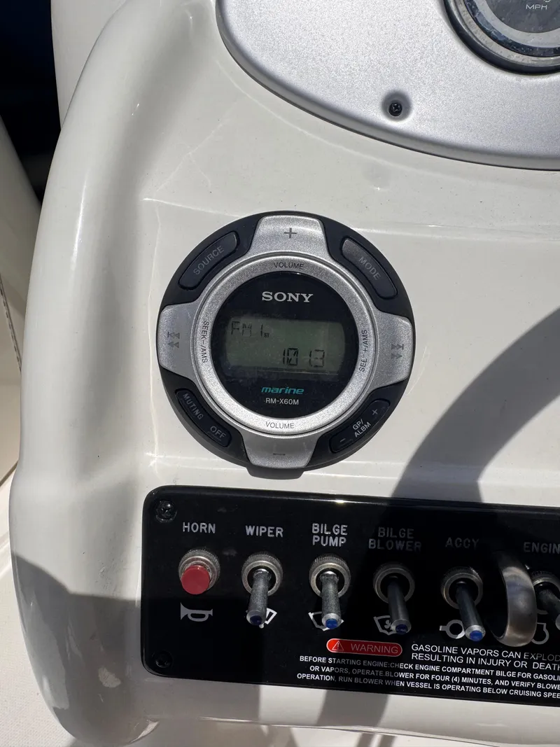 Slide: The Image of Control panel of a 2012 Sea Ray 200 SD boat with Sony marine radio. - 5