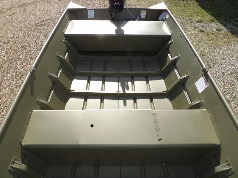 Slide: The Image of 2025 Crestliner 1648M CR Jon boat interior with bench seating and open layout. - 13