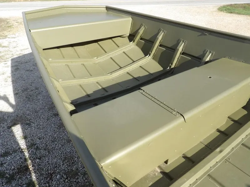 Slide: The Image of 2025 Crestliner 1648M CR Jon boat interior, showcasing durable seating and spacious design. - 14