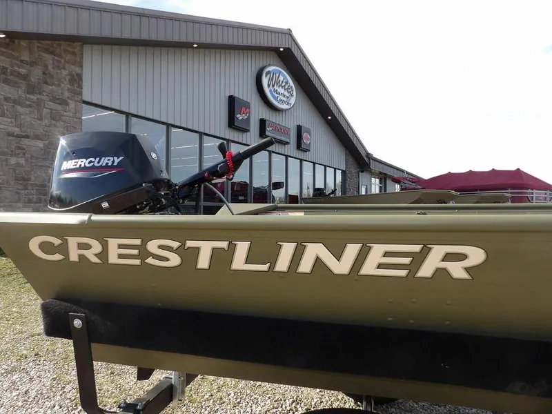 Slide: The Image of 2025 Crestliner 1648M CR Jon boat with Mercury engine outside dealership. - 15