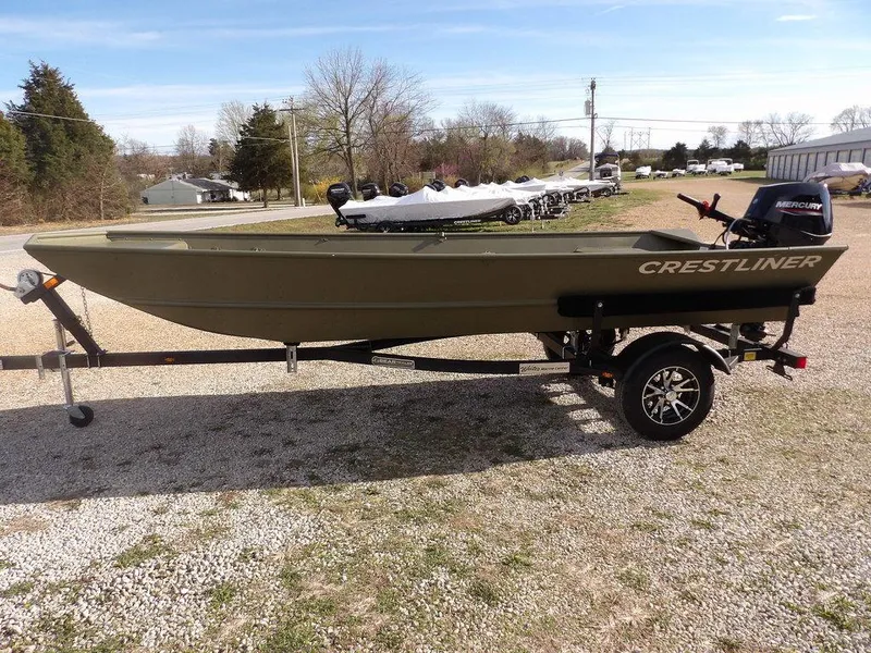 Slide: The Image of 2025 Crestliner 1648M CR Jon boat on trailer, parked outdoors. - 4