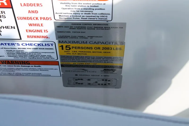 Slide: The Image of Capacity label on 2025 Bennington L Quad Bench 25 LFB, max 15 persons or 2083 lbs. - 10