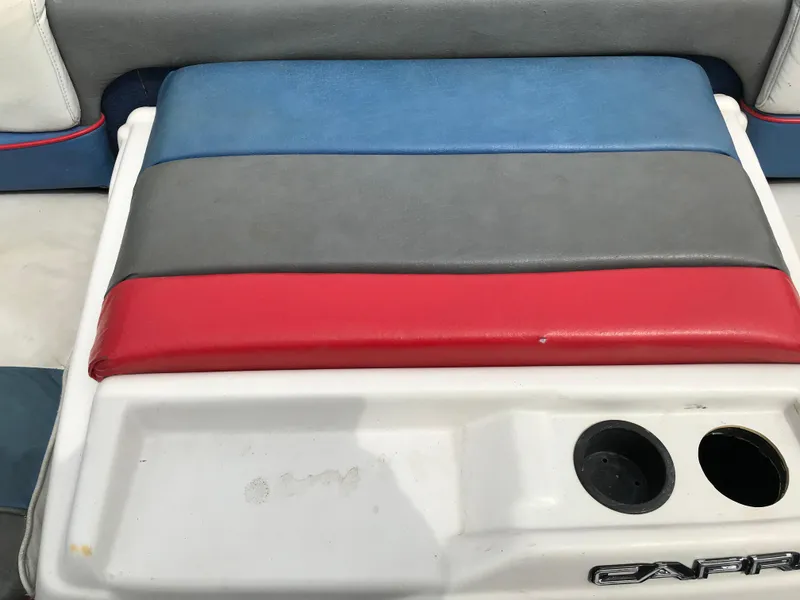 Slide: The Image of 1987 Bayliner 1950 Capri boat seat with blue, gray, and red upholstery. - 15