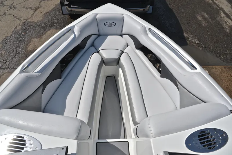Slide: The Image of 2012 Centurion ELITE C4 boat interior with white cushioned seating. - 21