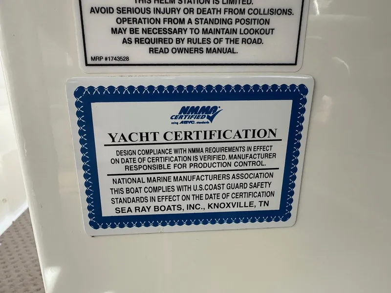 Slide: The Image of Yacht certification label on 2011 Sea Ray 250 SLX, verifying compliance with safety standards. - 23